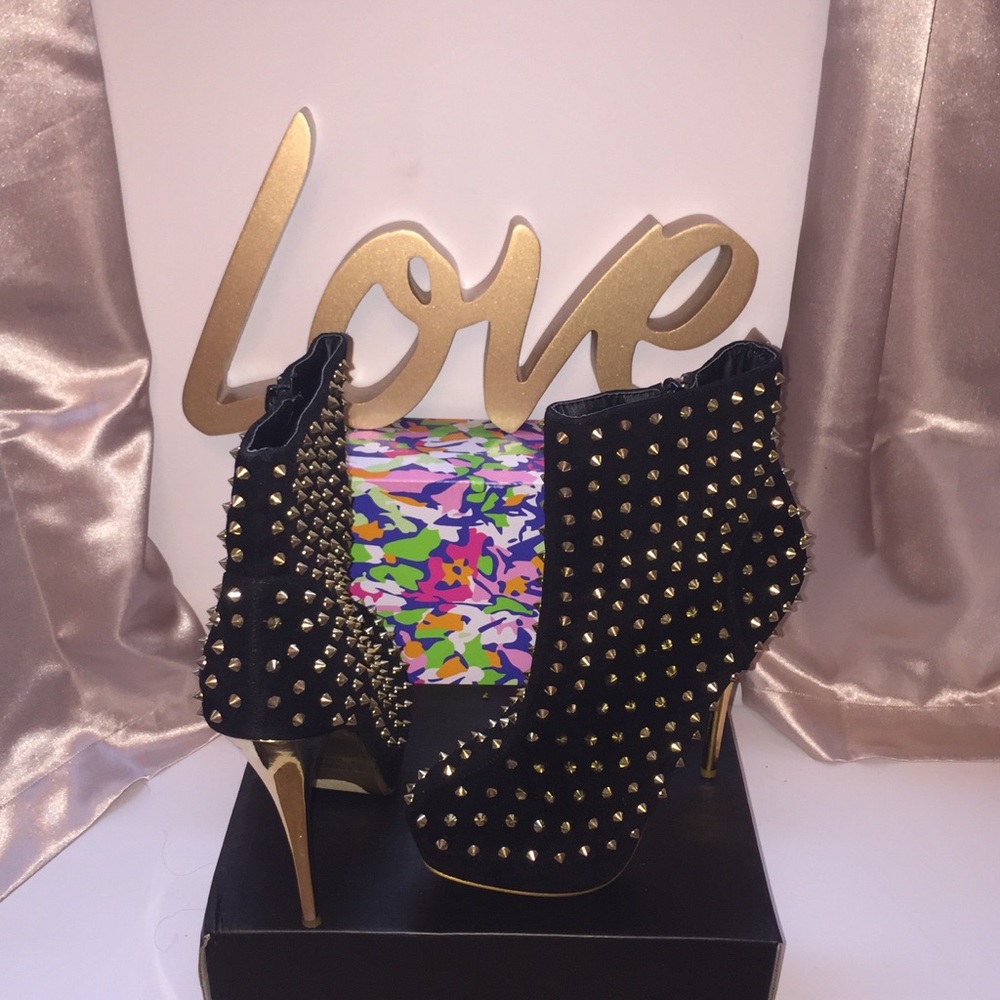 Gold and black platform heel